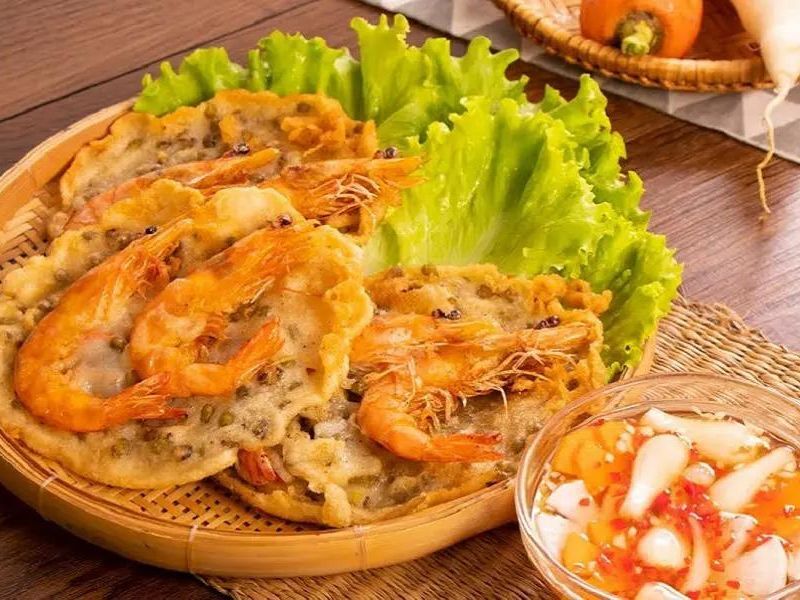 Capture the golden crunch of Hanoi’s culinary legend